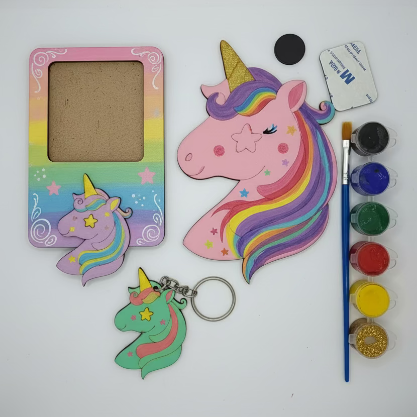Colorful unicorn-themed craft items including a frame, keychain, and paint supplies on a white background.