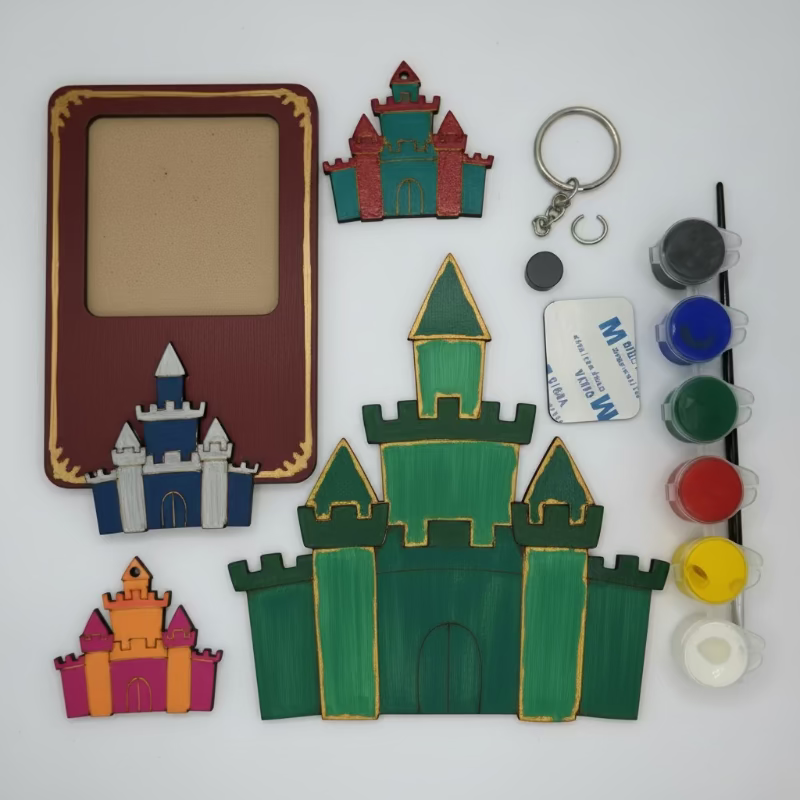 Colorful castle-themed craft items including a frame, keychain, and paint bottles on a white background.