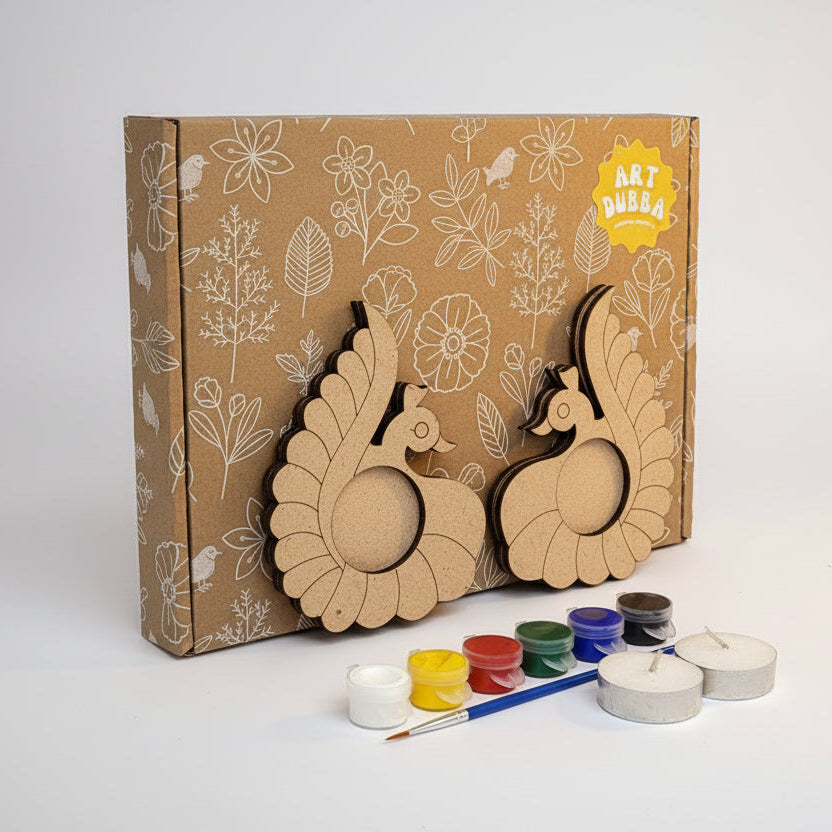 Art Dubba kit peacock shaped tealight holder and paint supplies on a white background