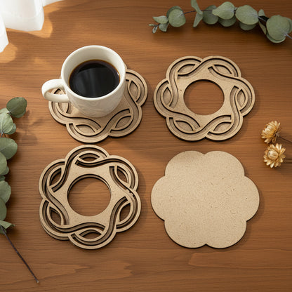 Art Dubba Four brown paper coasters with decorative cut-out designs on a white background