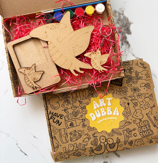 Box of wooden art supplies with 'Art Dubba' branding on a marble surface